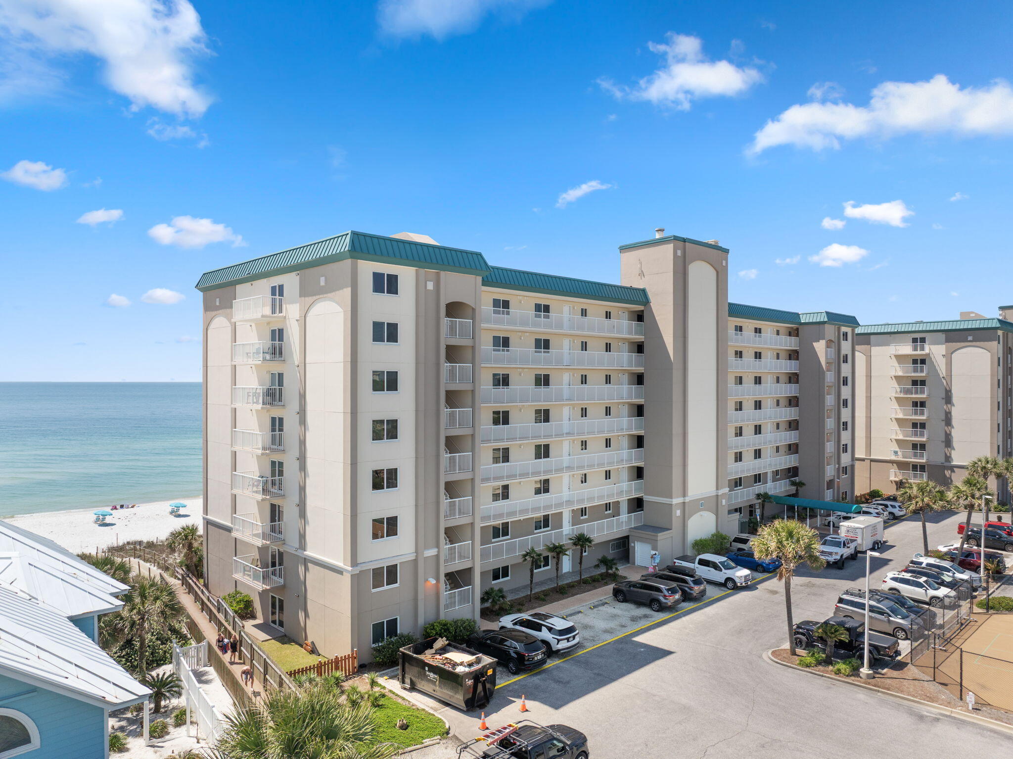 Welcome to Sandy Key #616! Beautifully updated, turnkey & perfectly positioned on the 6th floor, this 2-bedroom, 2-bath beachside condo in the highly coveted Sandy Key community offers unobstructed views of the Gulf's glistening turquoise waters. From the moment you walk in, the view captivates--visible from the kitchen, dining, living area & private balcony. With tile flooring throughout means no carpet, helping keep beach days easy & sand to a minimum. The spacious primary suite features a king-size bed, Smart TV, private balcony access, & an ensuite bath with a jetted tub/shower combo--perfect for unwinding after a day in the sun. A sliding pocket door creates a private guest suite with two double beds & its own spacious bathroom with a shower/tub combo, offering both comfort & privacy f or guests. The fully equipped and newly updated kitchen makes it easy to prepare Gulf-fresh meals or quick poolside snacks. The living area is furnished with a durable Rowe Sunbrella sofa (providing durability with rental guests) & Smart TV, offering a cozy space to relax while taking in the panoramic Gulf views. A full-size washer & dryer provide added convenience for beachside living. A ground floor storage closet also adds to the convenience factor - the perfect spot to store your favorite beach toys! Sandy Key is a rental favorite with a strong history of bookingsmaking this condo an excellent investment opportunity. Amenities include two beachfront pools (one heated seasonally), hot tub, fitness center, lighted tennis & pickleball courts, BBQ grills, lawn swings, & direct access to uncrowded, gated beaches. With on-site HOA management, this well-maintained complex offers the ultimate blend of relaxation & rental appeal. Seeking a serene escape or a proven income producer? Sandy Key 616 offers both and the best of Gulf Coast living. Buyer to verify all information during due diligence.