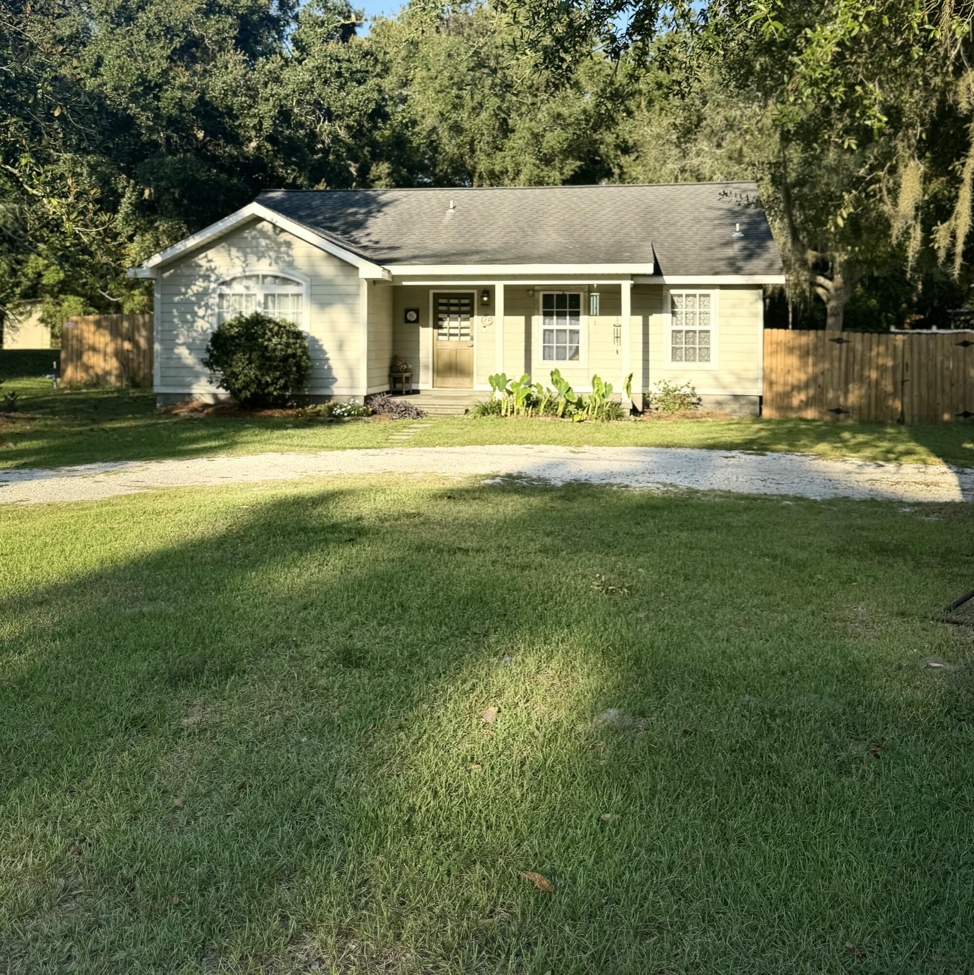 **Professional Photos Coming Soon** Seller offering $5,000 Buyer Credit. Charming 3BR/2BA bungalow in the heart of Freeport, just 12 miles from the beaches of 30A! Features an open-concept layout with spacious kitchen with new appliances.Enjoy outdoor living with both a covered front porch and a covered screened back patio and large fenced backyard perfect for relaxing or entertaining. The large backyard offers room to garden, play, or even add a pool and with no HOA, your options are wide open.Located on a quiet street with easy access to schools, shopping, and the coastDon't miss this opportunity to own near the beach with no restrictions!