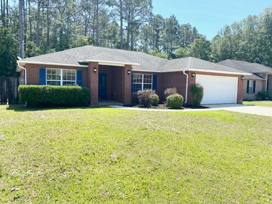 GORGEOUS ALL BRICK HOME! NEW paint, LVP flooring, stainless steel appliances, Quartz countertops & freshly pressure washed & move in ready! As you enter the home you will find lots of great features: covered entrance, formal dining room, large eat-in kitchen w/ breakfast bar, all appliances in place, pantry, cathedral ceilings & wood burning fireplace. Split bedroom plan for nice privacy. Master suite w/ double vanity sinks, garden tub & walk-in closet. All electric! Inside utility room leads you out to the 2 car garage w/ auto garage door opener & attic w/ pull down stairs. Off back you have a covered back patio & fenced backyard. 10/2015 Carrier HVAC & 10/2006 Whirlpool Water Heater. Welcome home!