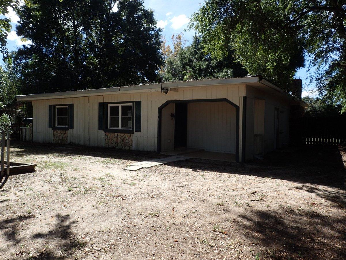 This REO property is now under auction terms. Pre-sale offers may be submitted. This property is subject to a 5% buyer's premium pursuant to the Auction Terms & Conditions. Conveniently located in the heart of Crestview, this Fannie Mae Homepath REO property has 3 bedrooms 2 baths and large open floor plan with fireplace. Located on a deep lot with lots of mature trees this fenced back yard home has an upgraded metal roof and though home has had some remodeling to accommodate the 1680sf it will not qualify for all types of financing, this home could easily be considered a diamond in the rough.