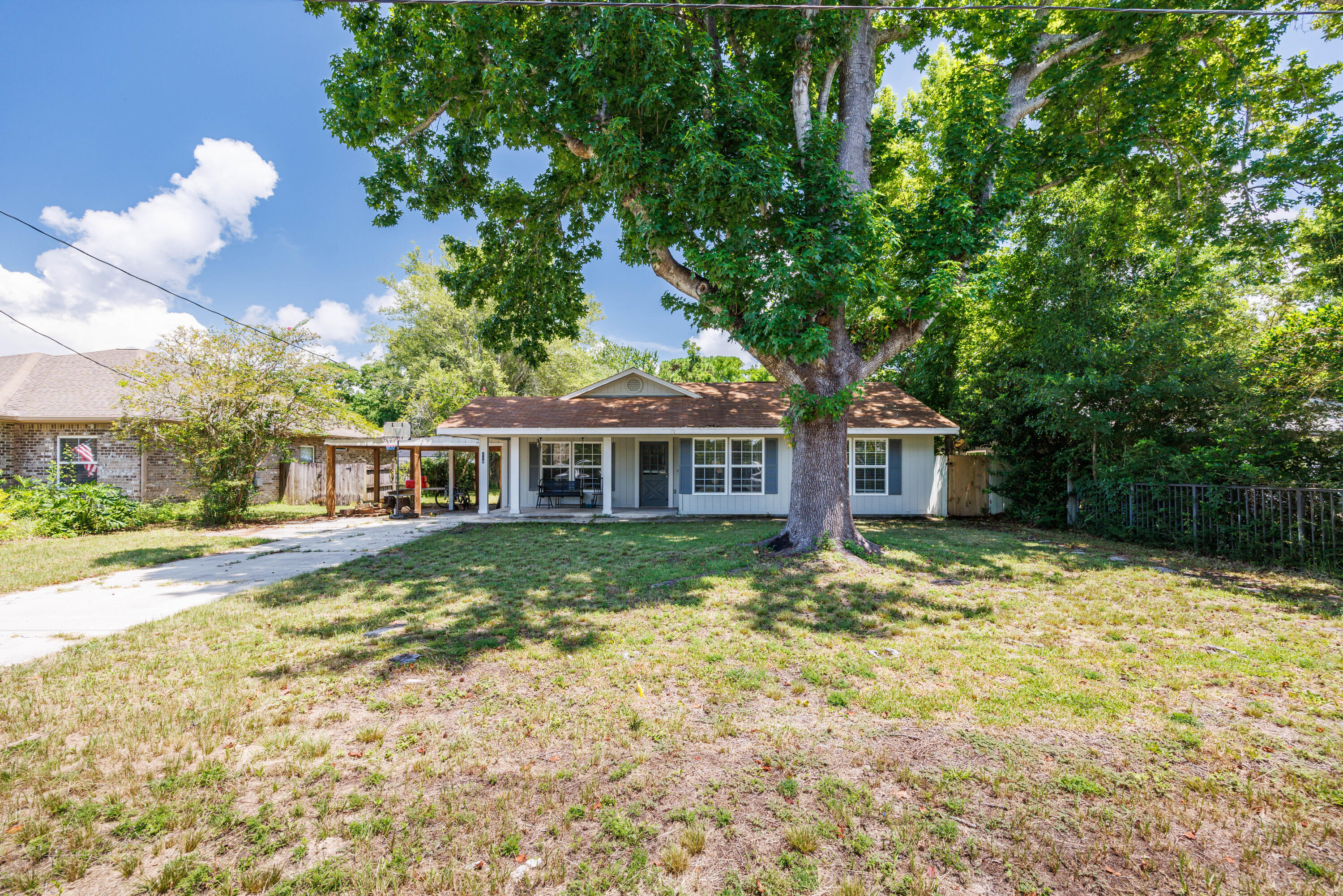 Charming and updated 3‑bedroom, 2‑bath home in Wynnehaven Beach Estates! Step inside to discover open living with beautiful floors and well‑appointed dual living spaces, ideal for both relaxing and entertaining. The bright kitchen boasts abundant cabinet space, flowing effortlessly into the dining area. The primary suite offers a peaceful retreat with a roomy walk-in closet. Outside, enjoy a large backyard with plenty of room for pets, play, or entertaining. Located just minutes from Hurlburt Field, the beaches, and everyday conveniences, this move-in-ready home combines comfort, charm, and coastal convenience. Don't miss your opportunity to make it yours!