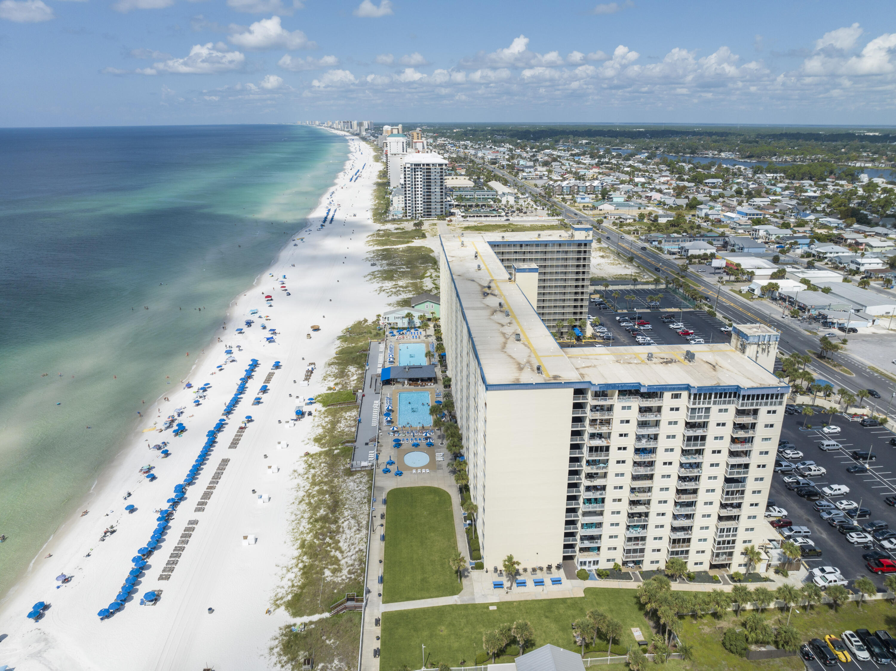 Welcome to Regency Towers, a private, gated beachfront resort in Panama City Beach, FL. Showcasing a timeless elegance with classic, old Florida style that some may find nostalgic. This spacious 4 bedroom, 3 bathroom condo offers picturesque views of the gulf's pristine turquoise water and white sandy beaches. Unwind in the 310 square feet Florida room providing a front row seat to breathtaking sunsets over the Gulf of Mexico. Amenities include 560 feet of private beach, 2 pools with beach views, on site dining, game rooms, summer activities for the whole family, fitness room, volleyball, 24 hour gated security, and more!