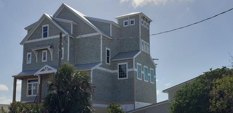 The Newest and only Gulf Front house UNDER CONSTRUCTION  on the West End of Panama City Beach.  This house has it all, 9 bedrooms which includes a bunk house bunk room that is a kid zone for room for 12 and the house is designed to sleep 40!!! This is the third phase of this designed built with modifications that includes a West Side Tower for fantastic views from a private office and library.  The house also has dripped Cedar Siding, a over size 2000 Sq. Ft. First floor Deck  with Brazilian Cumaru Decking, Oversized Pool & Spa, Rec Room that is just amazing. Oversize Kitchen, Great room with fantastic views, Wolf appliances and plenty of room for over 30 people to dine, all designed and decorated by Jennifer Suddes, The Magnolia House Group, LLC. Completion Date is projected: 3/31/2021