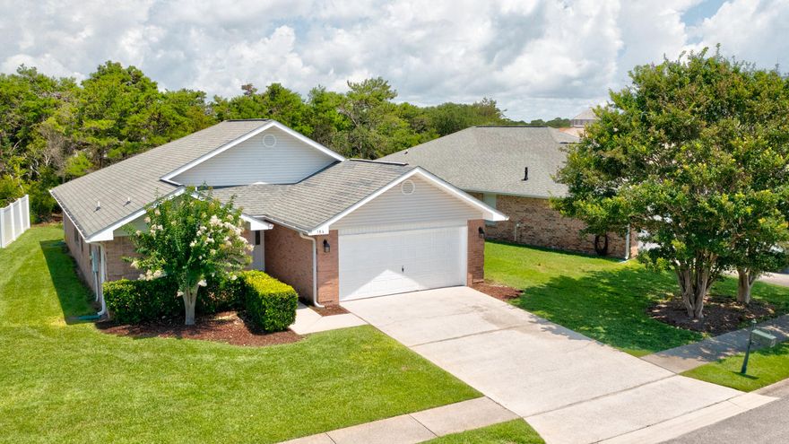 Walk to the Private Beach! Updated with all tile floors, fresh paint, granite counters in Kitchen & Baths, & stainless steel appliances!  No Carpet! 4BR/2BA all brick home in the gated neighborhood of Paradise Retreat at the beach!  Brick home with 2 car garage. Split 4 bedroom plan with 2 baths. The kitchen opens up to the dining area & huge great room with vaulted ceilings. 2 car garage. Other features include a separate walk-in laundry room, garden tub, separate shower, & double vanities in the Master Bath.  BUILD a POOL in your back yard, maybe 10 X 22!  Short & Long Term Rentals are permitted!! Some short term rentals have grossed as much as $80k this year! Natural Gas is available in the neighborhood! Dimensions & Important other info should be verified.  VERY LOW  Association Fees!