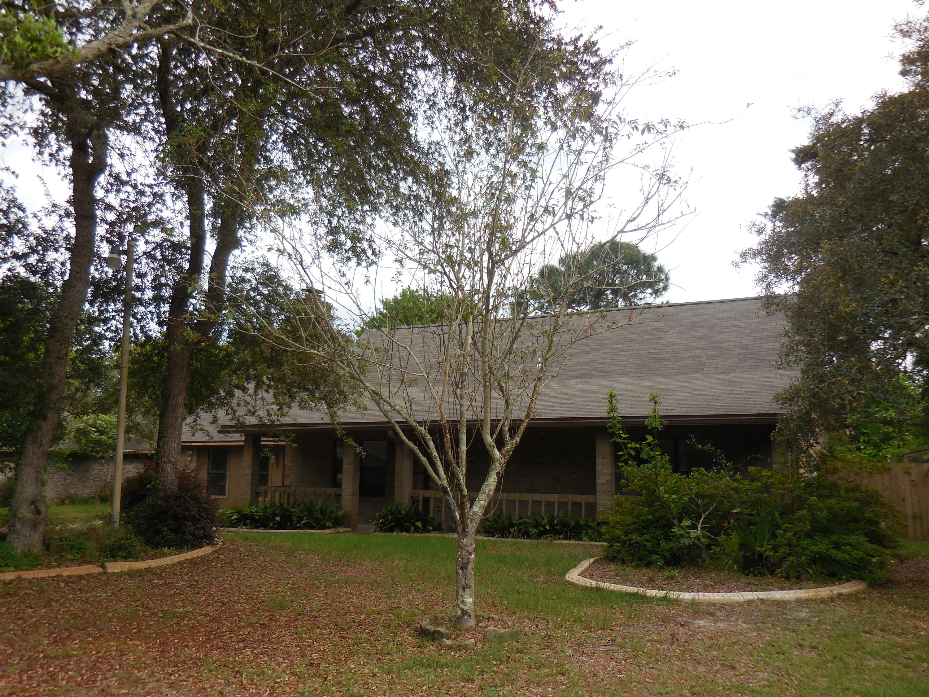 REO. This fantastic opportunity/home features a game room with a bar and a huge Florida room off the kitchen and dining area with its own full bath. Two bedrooms and another full bath are downstairs, while the other two bedrooms and the third full bath are upstairs along with a vented bonus room and an attic storage closet. The living room is vaulted to the 2nd story and has a stunning fireplace. Out back you will find a large deck perfect for entertaining after renovations. This home presents an opportunity for you to finish it off with all of your own choices of colors, textures and styles of flooring, cabinets, counter tops, fixtures, appliances, and more.