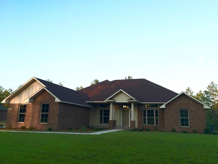 2786sf home in Nichols Creek on 1 Acre. 4 Bed/3 Bath. 3 car Side-entry Garage. Spacious 22'x19' Florida Room. Electric Fireplace in Great Room. Wraparound Bar Kitchen layout with 3cm Granite countertops, recessed & pendant lighting, and Custom cabinets with undermount lighting. Ceramic tile in Kitchen, Breakfast Area, Laundry Room, and Bathrooms. Master Bath has two walk-in closets and linen closet. Rounded corners. Energy-efficient.Minutes from I-10. Easy access to Hurlburt Field and Navarre Beach.