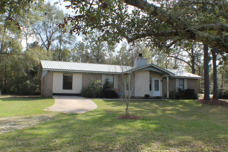 Great 3 bedroom 2 bath all brick home on half an acre in the country. Greatroom with fireplace. Enclosed garage makes up the Bonus Room or Game Room! Laminate floors with carpet in the bedrooms and crown molding to top it off! County zoning. Great buy on this one! Peaceful and tranquil country living, yet located so close to shopping, schools, restaurants, and entertainment.