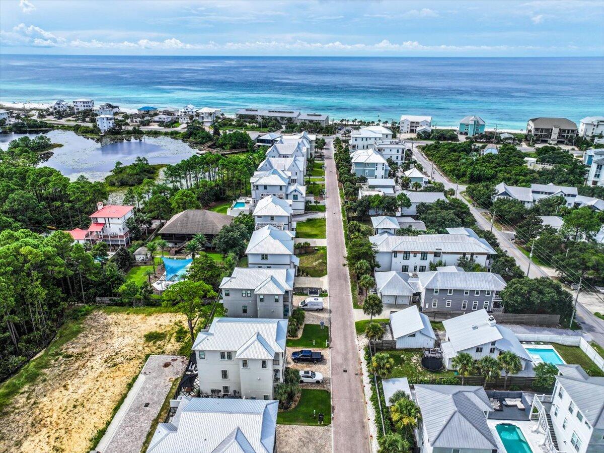 *OPEN HOUSE AUG 28-30 FROM 11:00-4:00 IN MODEL HOME LOCATED AT 415 DOLPHIN DR. SAN ROSA BEACH, FL*Stunning new construction on 30A! This gorgeous 2-story home is located in Serenity at Dune Allen, directly across from the Dune Allen Beach Access. Currently under construction, the home will showcase high-quality finishes throughout, including luxury vinyl plank and tile flooring (no carpet), quartz countertops, and beautifully tiled showers.The first floor features a spacious open layout with a gourmet kitchen, large living area, one bedroom, a full bathroom, and a half bath, along with a charming covered front porch. Upstairs, you'll find three generously sized bedrooms, two full bathrooms, and a versatile den. A screened-in second-floor porch provides the perfect spot to enjoy the coastal breeze.
With its prime location, thoughtful design, and modern finishes, this home offers the ideal blend of comfort and style for full-time living, a second home, or an investment property.