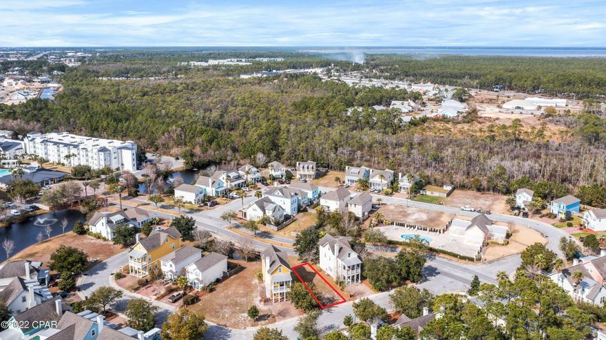 Amazing opportunity to build a beautiful Florida cottage just a few blocks from the beach! Harrison's Walk is a charming community consisting of beautiful beach cottages nestled among serene lakes and lush surroundings. The development already has underground utilities in place, so the lot has electric, gas, water, sewer, and cable ready to go. The community does not allow short-term rentals making it perfect for a primary residence or long-term rental (6+ months). Harrison's Walk offers a nice community pool and is close to great dining and shopping options as well as fun attractions like Shipwreck Island Waterpark and Rock'it Lanes.