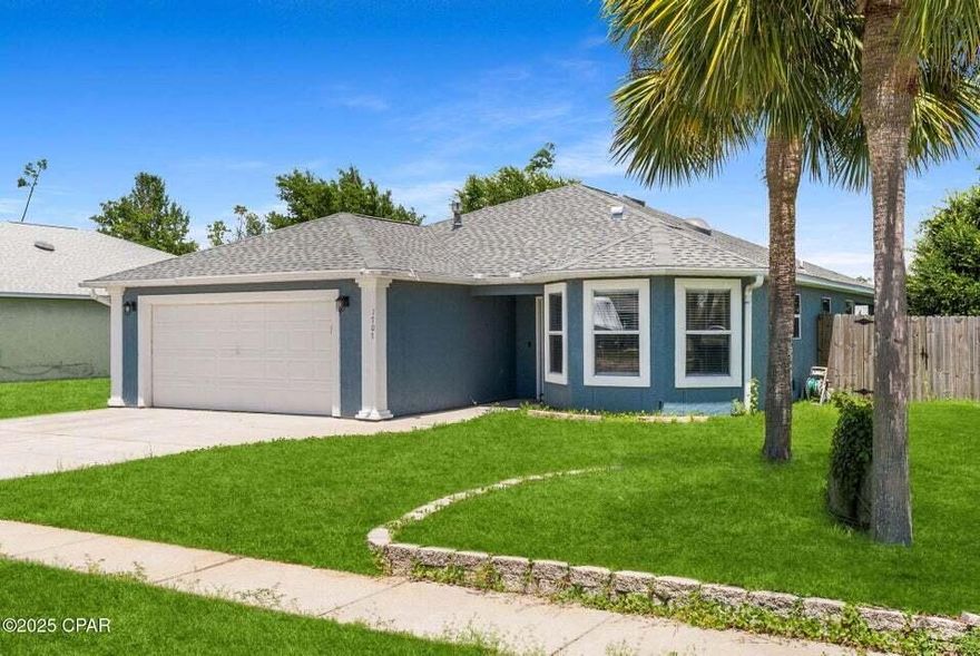 Recently updated and improved!Welcome to 1707 Scarlett Blvd - A Beautiful 3-Bed, 2-Bath Home in the Heart of Lynn Haven! Assumable FHA loan at 5.99% interest (approximately 1 full percentage point below today's rate). Mortgage balance is $278,000+/-. New backyard fence and all new interior paint. Possible flooring allowance can be provided with acceptable offer. Step inside this charming home located in the desirable Magnolia Meadows neighborhood. Featuring Brazilian cherry flooring throughout the main living areas, this home offers a spacious open-concept layout perfect for both relaxing and entertaining. Kitchen is decked out with newer stainless steel appliances. Enjoy three generously sized bedrooms, two full bathrooms, and a private backyard with fire pit, ideal for outdoor gatherings or playtime. Located within walking distance to Cain Griffin Park, you'll have access to ball fields, basketball courts, and a splash pad perfect for those warm Florida days. This home is also just minutes from dining, shopping, and top-rated schools, including the best public and charter school options in Bay County. Don't miss your opportunity to own this beautiful home in a fantastic location. Schedule your private showing today!