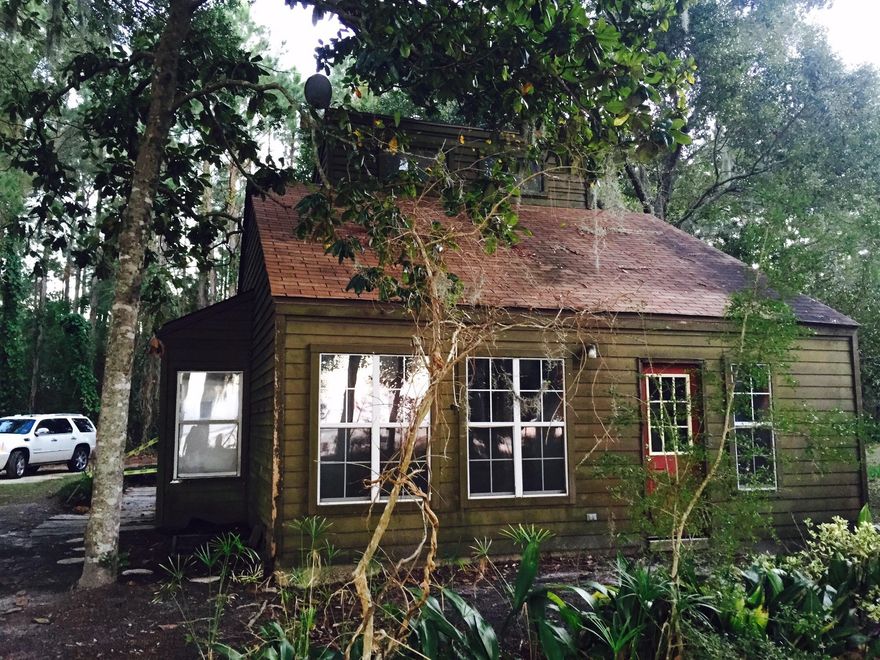 REO, Santa Rosa Beach cabin by the water is a great opportunity property. The property features soaring ceilings, bedroom on the first floor, and a loft that could be used as a second sleeping space. Purchase this property and live like you are on vacation every day!