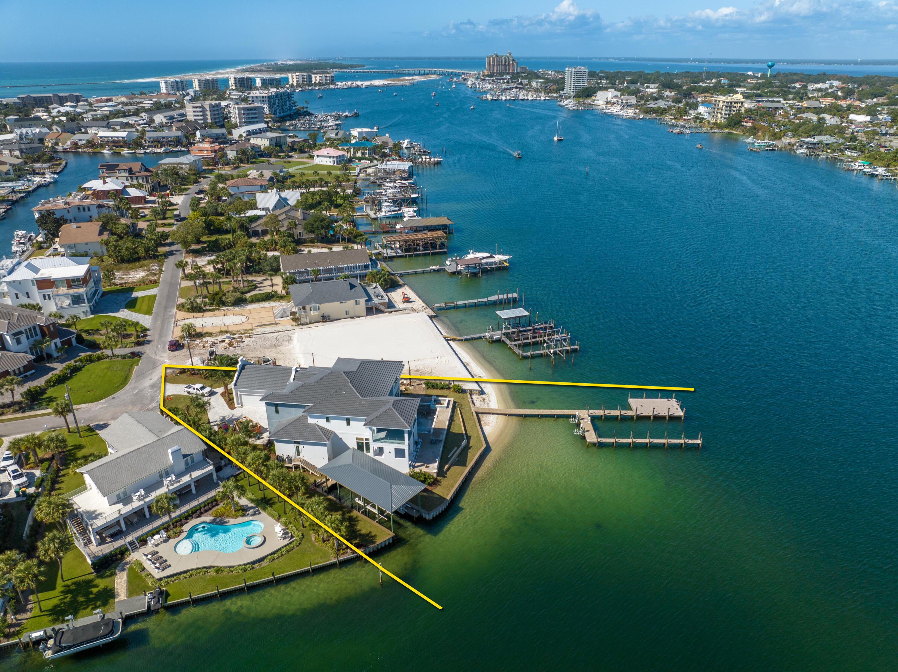 Spectacular New Construction on the Scenic Harbor of Destin, Florida!531 Norriego Road epitomizes perfection, aligning the superiority of not only one of the finest lots on deep-water in the exclusive beach and yachtsman's enclave known as Holiday Isle, but impeccable new design and construction providing immense structural integrity, innovative and updated building technologies, and magnificent windows and doors providing the most stunning view corridors in every direction and from every room!  The new dock will accommodate massive yachts, while the inset slip will accommodate a companion vessel of impressive beam and length as well.  While the moorings in your backyard secure your marine vessels, your four-car garage will protect your coveted car collection! The floorplan was...