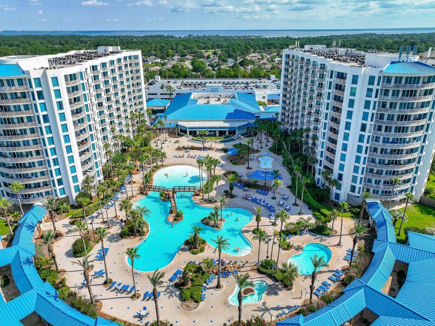 This beautifully updated two-bedroom, two-bath beach condo on the 4th floor of The Palms of Destin combines comfort and convenience with resort-style living. The open-concept living and dining area flows onto a private balcony with sunrise views over Henderson Beach.  The Palms of Destin is known for its exceptional amenities, including the signature lagoon pool with cascading waterfalls, multiple additional pools, a hot tub, playground, fitness center, and tennis, pickleball, and basketball courts. Enjoy the on-site restaurant serving lunch and dinner with the convenience of room service and seasonal poolside service, as well as an on-site coffee bar for your morning pick-me-up. A complimentary seasonal shuttle provides easy access to the beach. Updates to the condo include a new washer and dryer, fresh paint, new beds and mattresses, a daybed, and upgraded wood-look tile flooring.  This beach condo is sold fully furnished making it turn key.  All utilitieswater, sewer, electric, cable, WiFi, phone, and trashare included in the HOA dues for stress-free ownership.  Ideally located in the heart of Destin, this amenity-rich resort offers nearby shopping, dining, and entertainment, making it an excellent choice for a primary residence, vacation retreat, or rental investment.