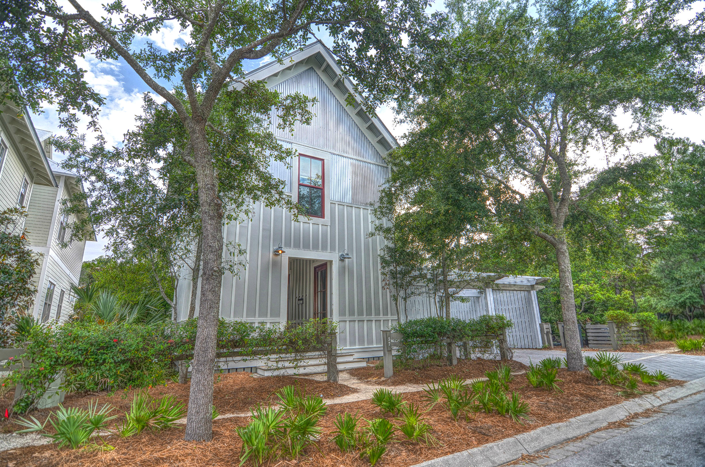 This stunning watercolor home features breathtaking Western Lake views from the rooftop deck and screened-in porches. This home is just a short bike ride to the beach, is next to Marina Park and located just steps from the Western Lake footbridge that leads to Watercolor's Boathouse and Cerulean Park in the heart of Watercolor. The 5 bedroom 5 bath home has been newly remodeled to include both interior and exterior paint! Hardwood floors throughout and a carriage house! This is a must see!