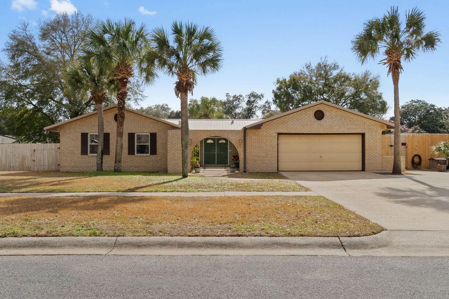 Welcome to Kenwood, one of Fort Walton Beach's most sought after neighborhoods. This 4 bedroom, 2 bath home sits on a spacious lot and offers the perfect combination of location, updates, and backyard living. Conveniently located within the neighborhood elementary school district and just minutes to Eglin AFB, Hurlburt Field, beautiful beaches, shopping, and popular local restaurants, this home delivers both comfort and convenience. Inside you will find an open living area with updated finishes, granite kitchen countertops, laminate and tile flooring throughout, and no popcorn ceilings. The flexible floor plan offers multiple living and dining options to fit your needs, plus a cozy wood burning fireplace and updated windows and sliding glass doors that bring in natural light. Step outside to your private backyard retreat featuring a 40x20 in ground pool, a large 11x30 covered screened porch with composite flooring, and a hot tub that conveys. The fully fenced yard provides ample space for entertaining, pets, or play.
Major updates include a new HVAC system and ductwork with UV light installed in 2024, metal roof installed in 2017, well pump recently replaced, irrigation system, new fencing, and an extra concrete parking pad for additional vehicles or toys. Homes in Kenwood with this lot size, pool, and level of updates do not come available often. Schedule your private showing today.
