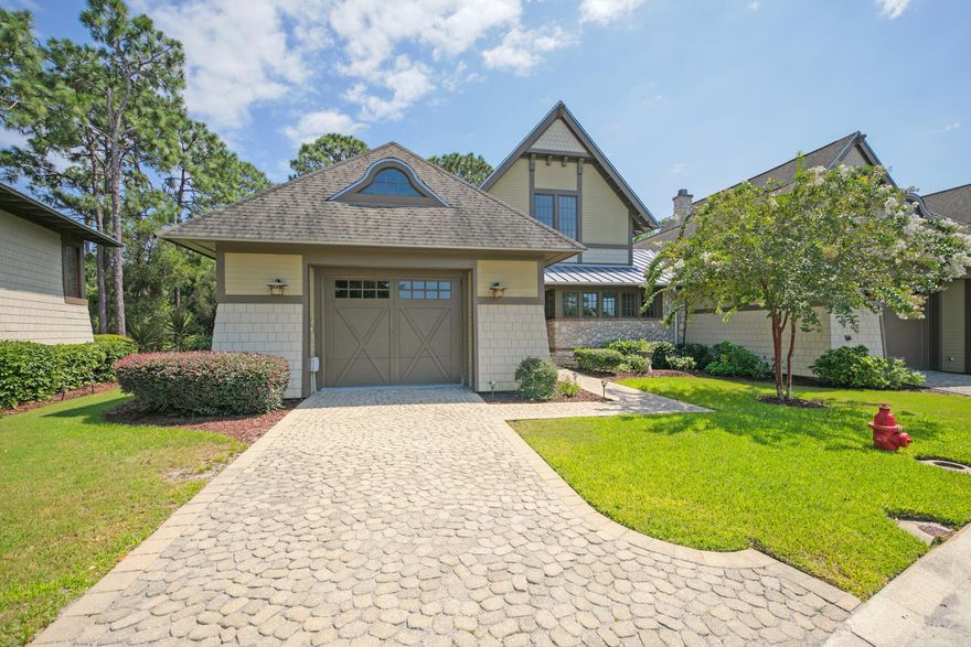 After entering the gate into Wild Heron, you realize you are in a ''Coastal Sanctuary''. Minutes from the beaches and 30A, you immediately feel at one with nature, away from the crowds. This guarded and gated community offers calm and security for both full time residents and second homeowners in this carefully planned low density development of 750 acres. This beautiful townhome offers luxury living with low maintenance. The units are handsome Coastal Craftsman designs by renowned Dungan Nequette Architects. Upon entering the home you look directly into the light filled great room with beamed ceilings, gas fireplace and a large bank of windows that showcase the conservation land behind the home. The spacious kitchen is off the great room, with a breakfast bar, large island, commercial grade stainless appliances, solid hardwood cabinetry, and a wine fridge. Hardwood floors throughout, tile in all baths with Kohler Memoir faucets and fixtures, granite counters throughout, 8ft solid core doors. The Master is on the first floor with a large bathroom, dual sinks, separate tub and shower, and a generous walk in closet. Just off the living area is a powder bath. A lovely porch is off the living area which overlooks the nature preserve on this end unit. Also on the first floor is a laundry room with a sink and cabinets. The light filled staircase takes you to the second floor with two guest rooms, each with ensuite baths, as well as a sitting room/office. Wild Heron has a lakeside community pool, fitness center, boathouse for kayaks and paddle boards, community dock, fire pit, and miles of walking paths through the community. Golf and tennis are available with memberships through Clubs of St. Joe.