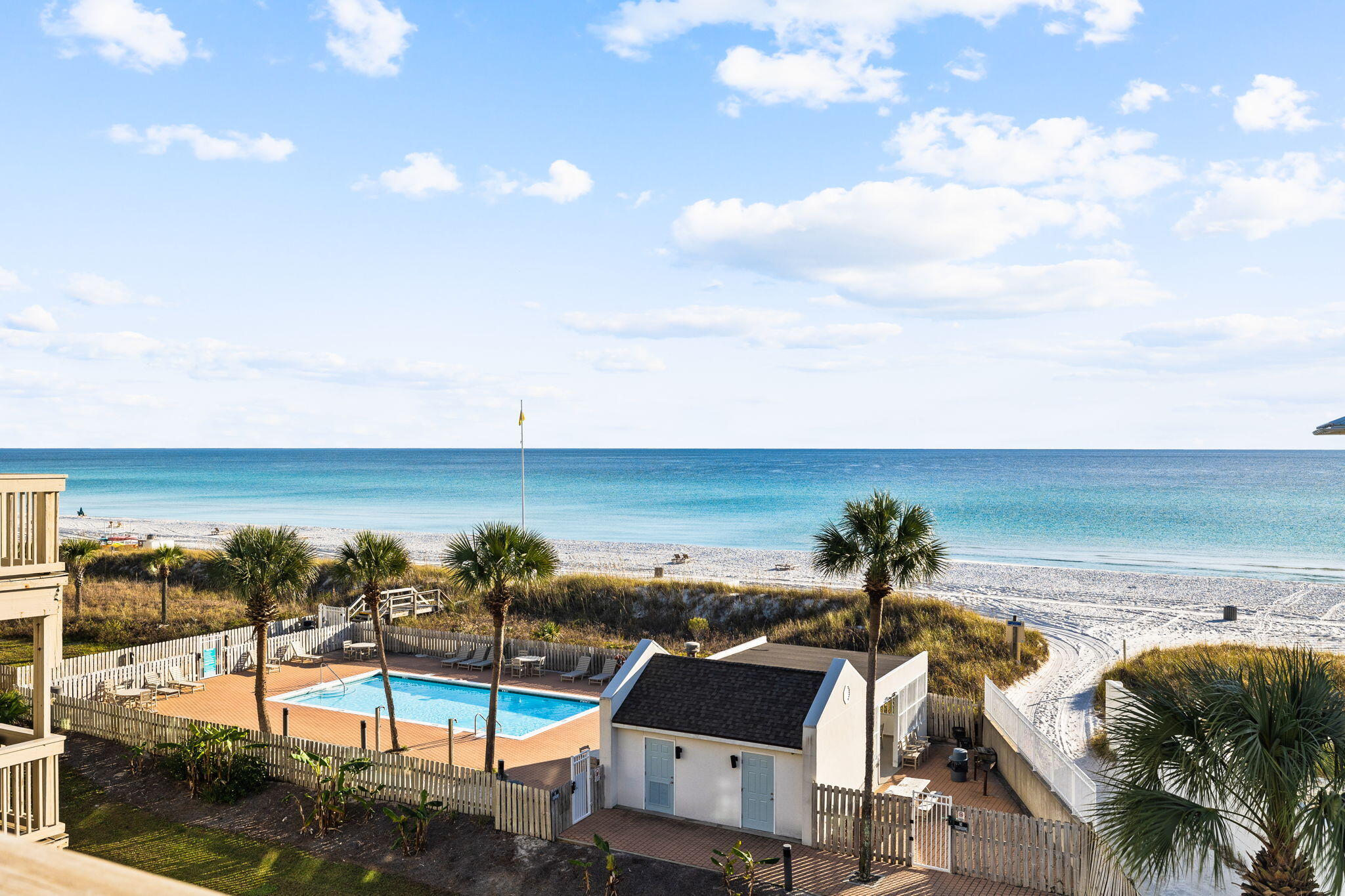 Escape to your own slice of paradise at this stunning beach retreat, where luxury meets coastal charm. Projected to generate over $71,000 in rental income per year, this newly-renovated beachfront residence is a premier investment property only six minutes from 30A. With spectacular gulf views from two separate beachfront balconies, Unit 65 has an amazing floor plan with the main living, kitchen & dining spaces on the first level along with a powder bathroom and extra storage underneath the staircase. The bedrooms are private and tucked away being located on the top level. The primary bedroom has a beautiful private balcony featuring stunning Gulf views and a recently remodeled primary bathroom. The guest bedroom is spacious and has access to its own full bathroom which has also been recently renovated. The interior of this unit includes shiplap, quartz countertops, modern lighting, LVP flooring, and stainless steel appliances. Fully furnished and rental-ready, Unit 65 comes with strong rental projections, making it a prime investment property. Ramsgate Harbour offers a 550ft private beach, community pool, and covered parking. The rental income projection & estimated expenses are available by request.
The buildings at Ramsgate Harbour have been beautifully renovated in the past few years which included new windows and sliding glass doors throughout every unit. The street-side balconies have been completely renovated. The buildings have fresh exterior paint, new light fixtures along with spalling work done in the parking area to ensure great condition of the pilings. The development plans to complete this renovation project by replacing all beachfront balconies. The assessment has been levied and the seller will pay for the full assessment of $87,820. The beachfront balconies will be a beautiful cosmetic upgrade. Updates will be provided in regards to the timeline of the beachside balcony work. This is an amazing opportunity to purchase knowing that the new assessment will be paid for and the buyer will enjoy gorgeous new balconies.