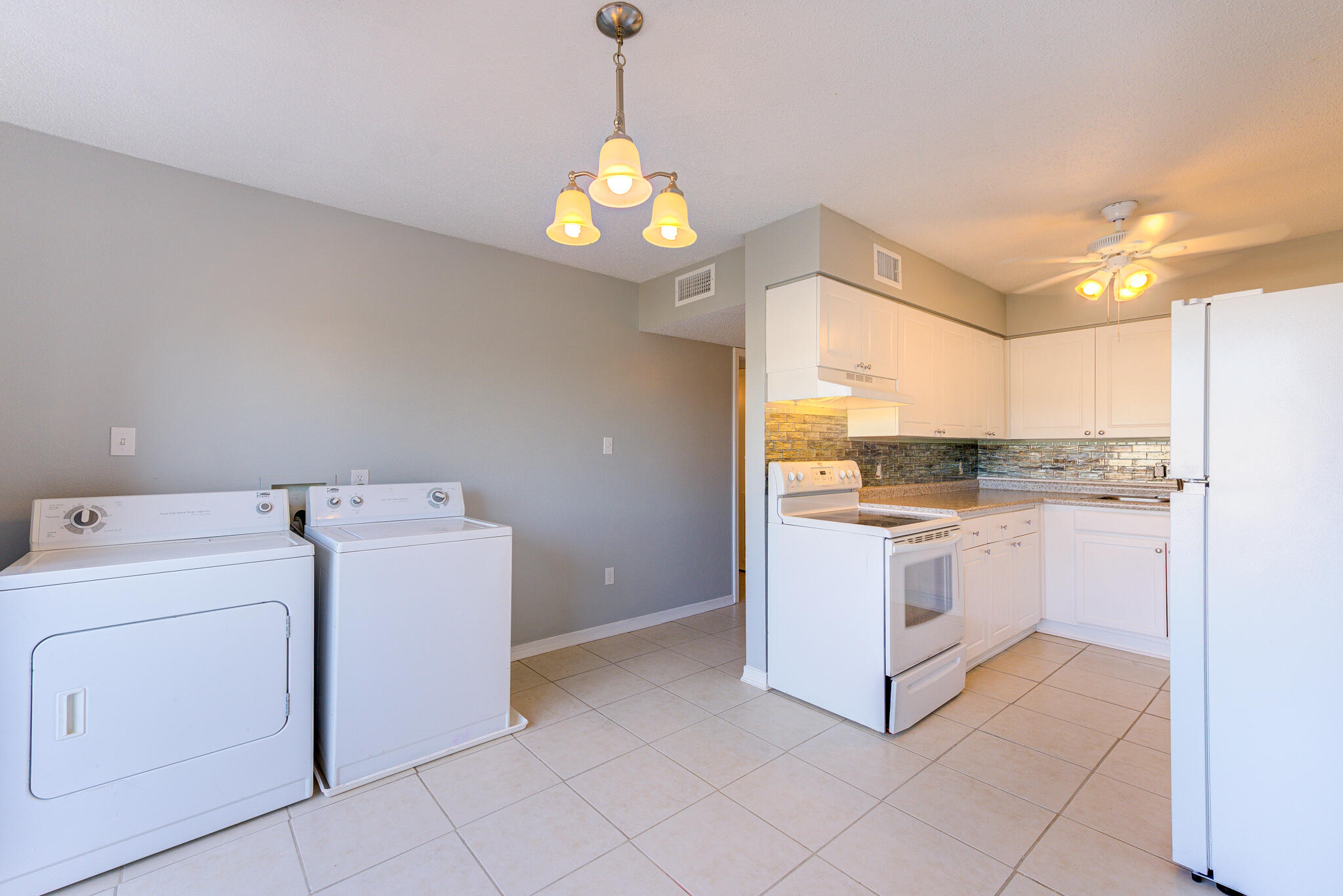 Looking for a retreat in the heart of Fort Walton. This home has has been freshly painted with new light fixtures, new LVP flooring, countertop and more... It also has washer and dryer hook up in the unit with washer and dryer. Enjoy kayaking or fishing of the community dock at Cinco Bayou or spend time hanging out by the pool overlooking the water. This community also offers grilling in the courtyard. All measurements are approximate and should be verified by buyer. The complex doesn't allow short term rentals or private boat slips