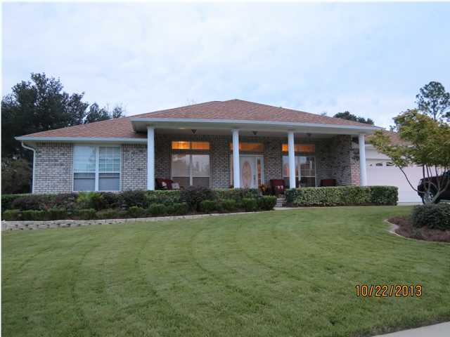 Located on a beautiful, custom landscaped lot, this immaculate home in the Fox Valley subdivision has it all! Features of this home include 20 inch tile flooring with custom trim, hand-scraped wood flooring, crown molding throughout, accent lighting throughout, CAT 5 wiring to all rooms, and a large enclosed Florida room! Outside, enjoy the serenity of your quiet, fenced backyard with brick paver curbing, stamped concrete patio, and tailored landscaping. Stay warm this winter in your living room with gas fireplace, tranquil accent lighting, surround sound, and cathedral ceilings. The large master suite boasts plenty of room for a king size bed and large furniture. The tray ceilings are accented by hand scraped hardwood flooring. The master bathroom has plenty of space with his and her