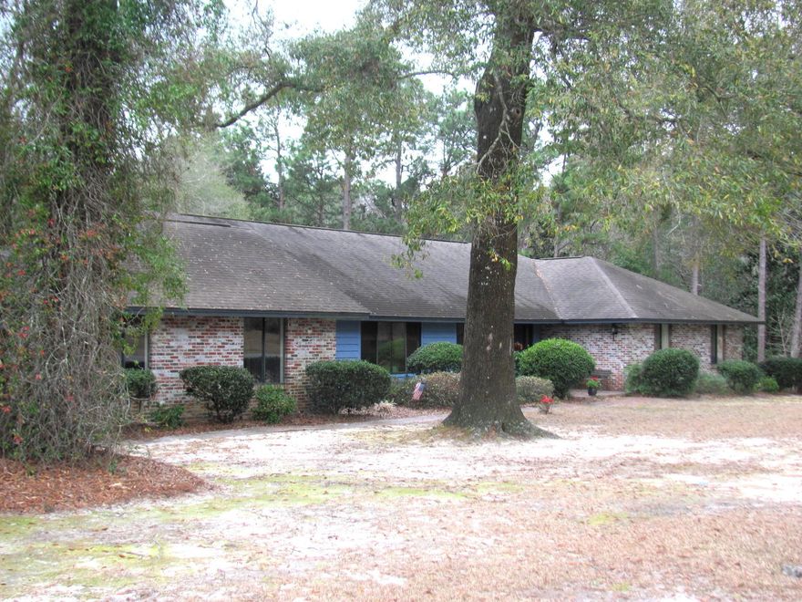 Don't miss out on this beautiful and spacious brick home! Located in a well established neighborhood, this home has it all. Upon entering the large foyer, you will see the open living and formal dining room. The kitchen has a breakfast nook that leads to the utility room, half bath and double car garage! The additional bedrooms are large and the additional bathroom has double sinks. The master suite is very spacious and features a huge his/her walk-in closet as well as two additional walk-in closets off of the master bathroom area. Features include, Hunter ceiling fans, wide doors that allow for wheelchair access, tons of closet space and large bedrooms. Zone A/C and heat system and a wood stove. Large office/den, beautiful landscaping. Call for your tour today.