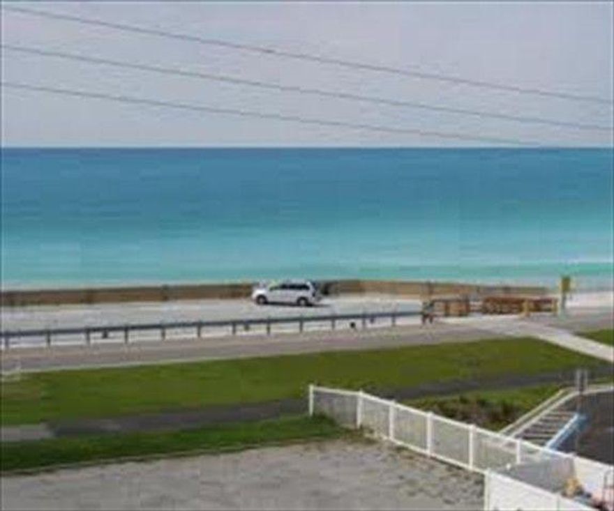 BEST UNIT IN THE COMPLEX!!!!! This unit does not disappoint. VIEWS from every room in the condo... the bedroom, the kitchen, the living room, and of course the balcony. The condo is 1 bedroom/1 bath that sleeps six comfortably with a master bedroom, bunk beds in the hall area and sleeper sofa. It has a full kitchen that has been recently updated and breakfast bar and dining area. Sit on the couch in the living room and watch the sun sparkle across the water. This is an awesome vacation rental and consistently grosses $24k+ per year. This gem won't last long.