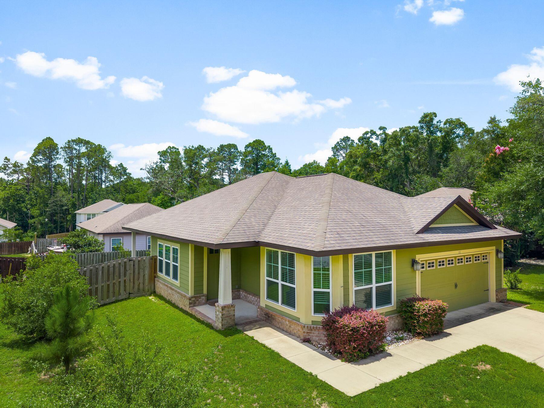 Discover this delightful 3BR/2BA Craftsman Cottage nestled in the desirable Canopies of Freeport community! Situated on a peaceful cul-de-sac lot in the heart of Freeport, this freshly painted home welcomes you with 9' and vaulted ceilings, sleek granite countertops, and stylish, durable vinyl plank flooring throughout.Step outside to enjoy your beautifully landscaped, fenced yard, perfect for relaxation or play. The cozy covered back porch adds an inviting touch for outdoor gatherings.The Canopies community offers fantastic amenities, including a pool and playground, all with a budget-friendly HOA. You'll love the convenient location with easy access to local shopping, top-rated schools, and just 15-20 minutes away from the white sandy beaches!
Don't miss your chance to own this charming Craftsman Cottage that offers comfort, style, and an unbeatable location. Schedule your showing today!