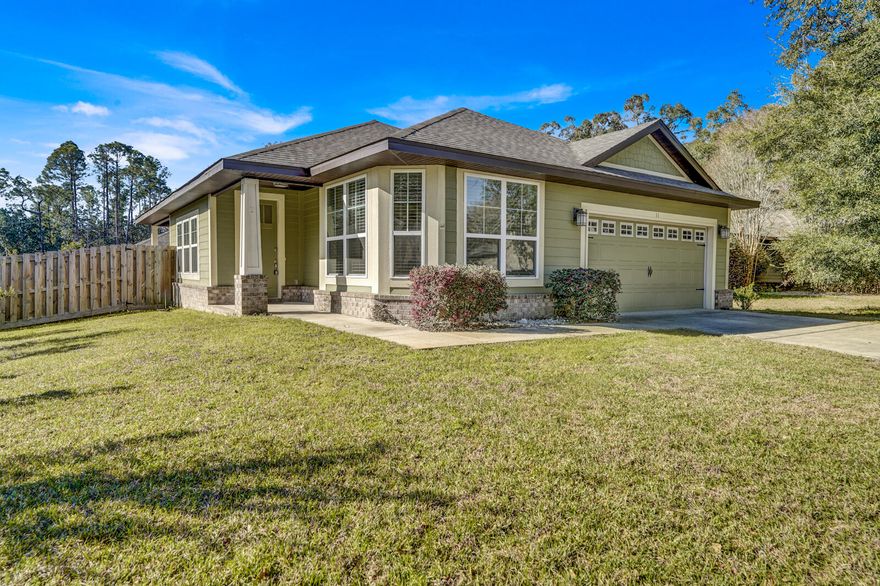 Discover this delightful 3BR/2BA Craftsman Cottage nestled in the desirable Canopies of Freeport community! Situated on a peaceful cul-de-sac lot in the heart of Freeport, this freshly painted home welcomes you with 9' and vaulted ceilings, sleek granite countertops, and stylish, durable vinyl plank flooring throughout.Step outside to enjoy your beautifully landscaped, fenced yard, perfect for relaxation or play. The cozy covered back porch adds an inviting touch for outdoor gatherings.The Canopies community offers fantastic amenities, including a pool and playground, all with a budget-friendly HOA. You'll love the convenient location with easy access to local shopping, top-rated schools, and just 15-20 minutes away from the white sandy beaches!

Don't miss your chance to own this charming Craftsman Cottage that offers comfort, style, and an unbeatable location. Schedule your showing today!