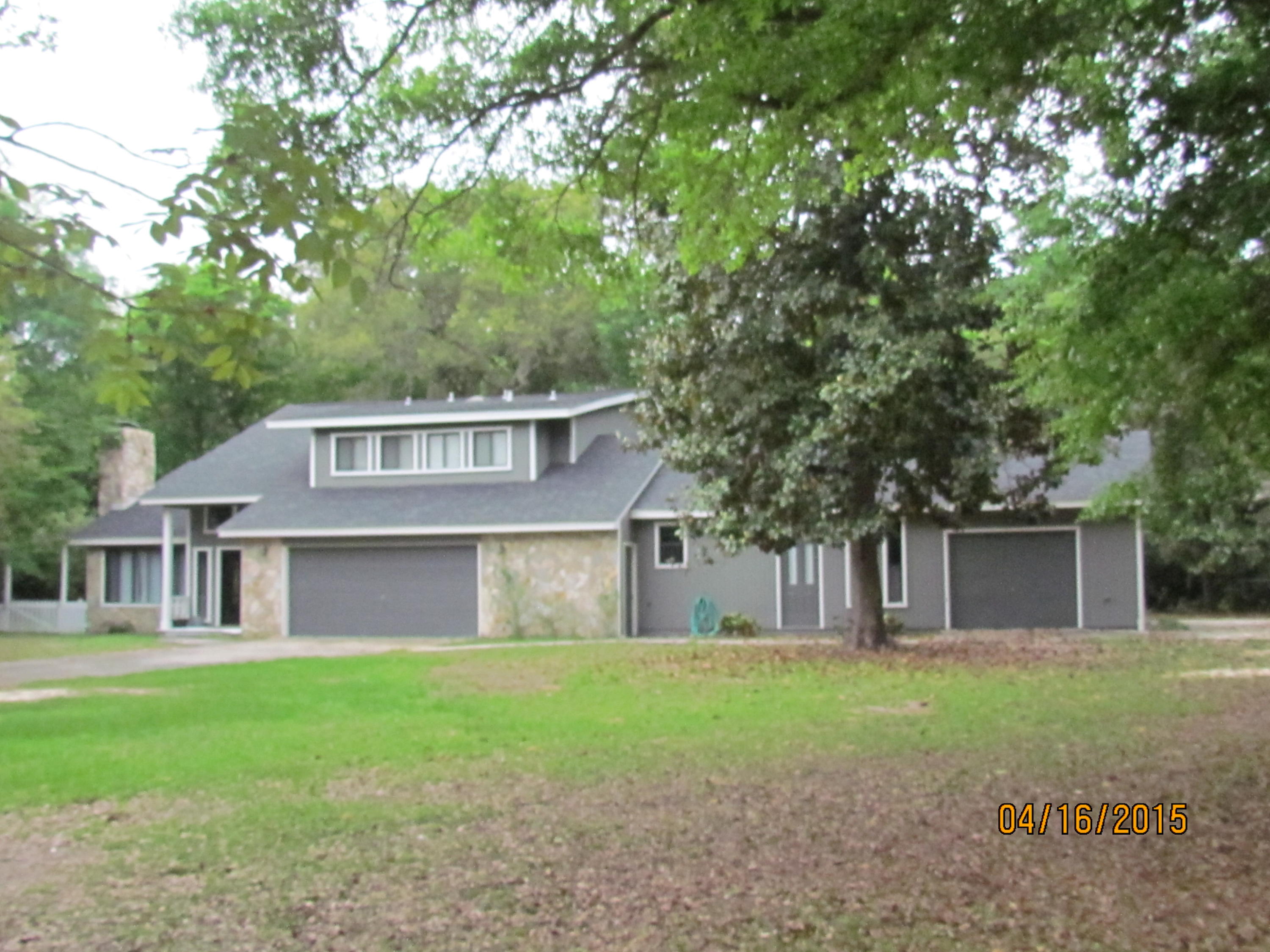 Want lots of space? This home offers it both inside and out! Grand 4/2.5 home in Lake Pipin Estates with extra guest quarters provides enough elbow room for everyone. This home features a grand fireplace, formal dining area, large Florida room, kitchen with breakfast nook, downstairs master & oversized 2 car garage. Need more room? how about a 36 X 24 separate guest room or workshop. Huge yard will delight kids & pets alike. Washer/dryer & refrigerator are non-warranted. Smaller garage off workshop is owner storage.Owner will consider medium sized dogs with a non-refundable pet fee and refundable pet deposit. Any pet must be spayed/neutered & housebroken. NO smoking! Any person 18 years or older need to complete a separate application.