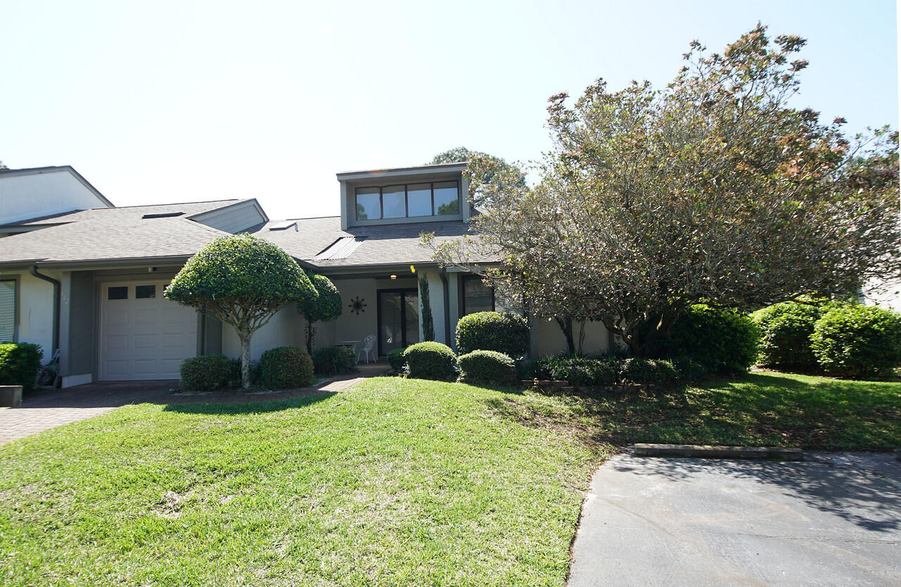 Pride of ownership is evident here!!This home is located in the heart of Bluewater Bay on the 2nd fairway of the bay course. The updated kitchen has newer cabinetry that leads into the breakfast nook with additional cabinets and counters. The counters include a work space for a home office. the sunroom is finished off with tile floor, shiplap ceiling and is heated and cooled. The master bedroom and the breakfast area each have sliding doors leading to the sunroom. Master bath is quite large with oversized closets, The walk-in shower is a nice addition as well. The living room ceiling is raised adding natural light with a larger feel. This home conveys refrigerator and front loader washer/dryer with pedestals. Bluewater Bay has a lot to offer including Golf, tennis , marina & more