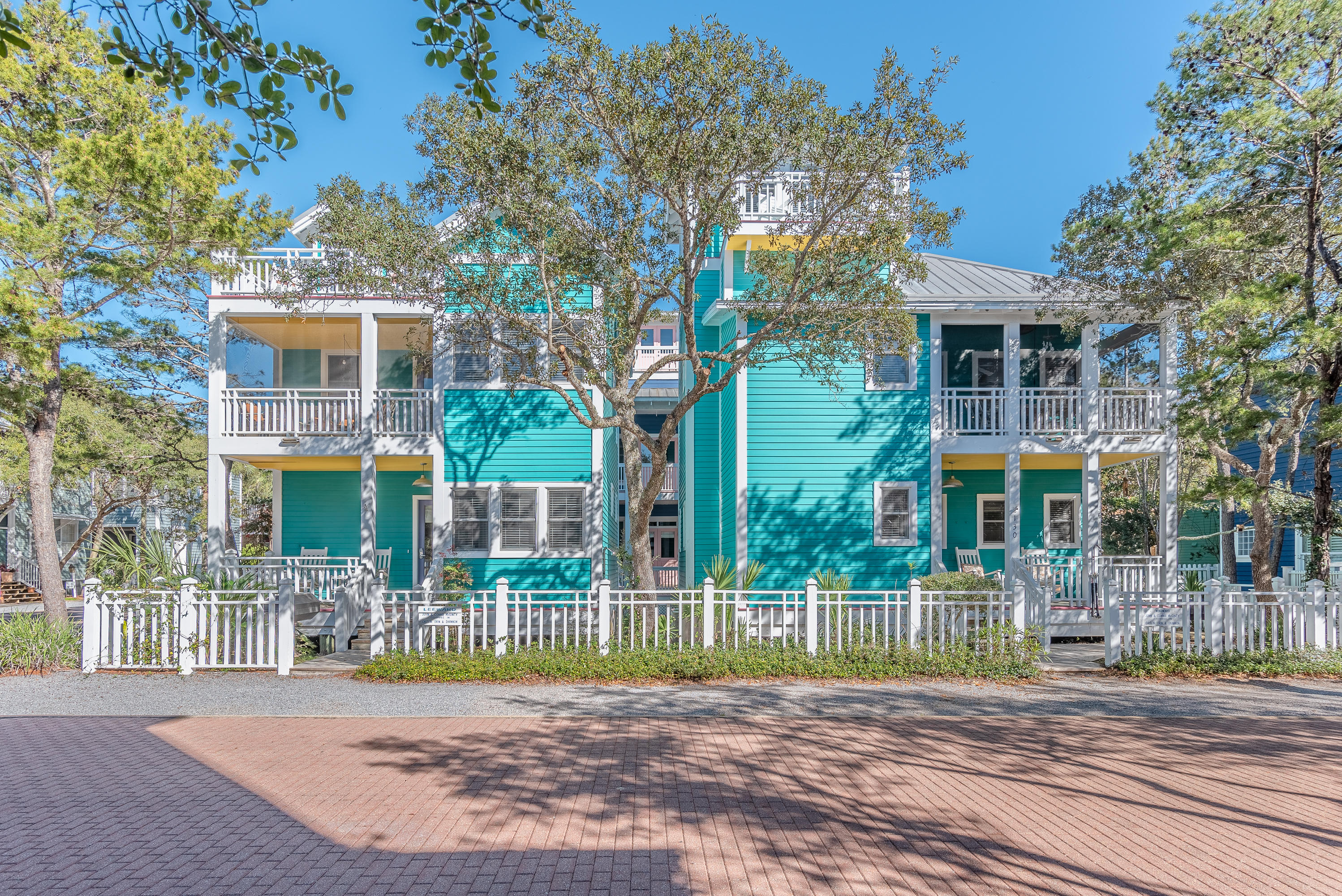 Main cottage- 3 bedrooms, 3 baths. Guest cottage- 2 bedrooms, 2-1/2 baths. Windward and Leeward were featured in Southern Living Magazine. Filled with light from windows throughout, these unique cottages share a corner lot steps from the west side pool and a short walk to the Pensacola Pavilion and beach. With charming architectural features inside and out, these cottages have it all! Windward has a king master bedroom with private bath, a queen guest bedroom with private bath and a queen tower bedroom with private bath and balcony offering spectacular views of the town, sunsets and gulf. Two porches, one open and one screened, provide relaxing sea breezes. Leeward is a delightful two bedroom version of Windward with private baths, two porches and a tower balcony also providing beautiful