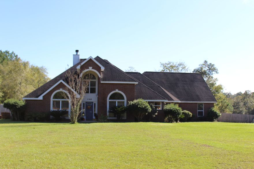 This stunning, move-in ready 4 bedroom, 2.5 bath home sits on 33.3 acres just south of DeFuniak Springs in the Eucheeanna valley. You'll know it's been well cared for upon entering. Features include Hardwood flooring throughout the main living areas, Semi-OPEN and SPLIT BEDROOM FLOOR PLAN, GRAND VAULTED CEILINGS, and 2 FIREPLACES to cozy up to on those occasional cool Florida evenings. The Kitchen has GRANITE counter tops ample cabinetry with built in desk and breakfast bar. Extend your entertaining space out onto the POOL patio with a COVERED LANAI where you'll enjoy looking out over the tranquil 33+ acres, perfect for enjoying your morning coffee and afternoon Bar B Que's by the pool! The Private Master suite, has patio access, along with large HIS and HER WALK IN CLOSETS and...