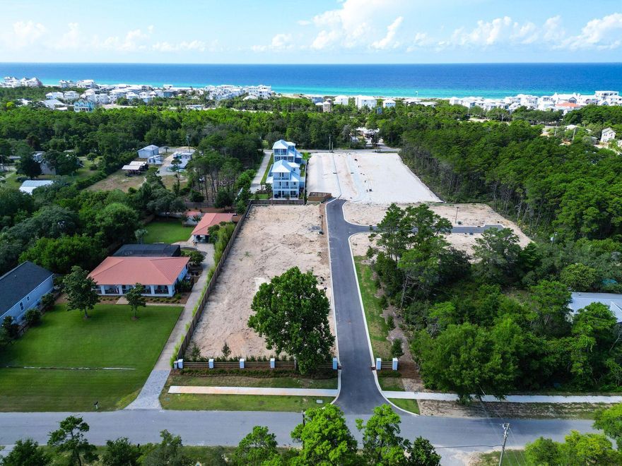 Development Order in hand, this 12-lot subdivision in Walton County is a fantastic opportunity for builders and developers looking for a ready-to-go project near Florida's sought-after Emerald Coast. With tap fees paid and all utilities--water, electric, and gas--installed at each lot, this property is fully prepared for vertical construction, saving time and upfront costs.The subdivision features twelve spacious lots, six of which offer potential water views, providing added appeal for future resale or custom home builds. Infrastructure is complete, including finished community roads and a professionally landscaped and landscaped entrance that enhances the overall curb appeal. Perfectly positioned just minutes from public beach access and the natural beauty of Camp Helen State Park, this location offers both tranquility and convenience. Whether you're envisioning a private, gated enclave or planning to sell the lots individually for profit, this development delivers exceptional value. Opportunities like this don't come along oftendon't miss your chance to secure a prime piece of coastal Florida real estate with everything in place to begin building.