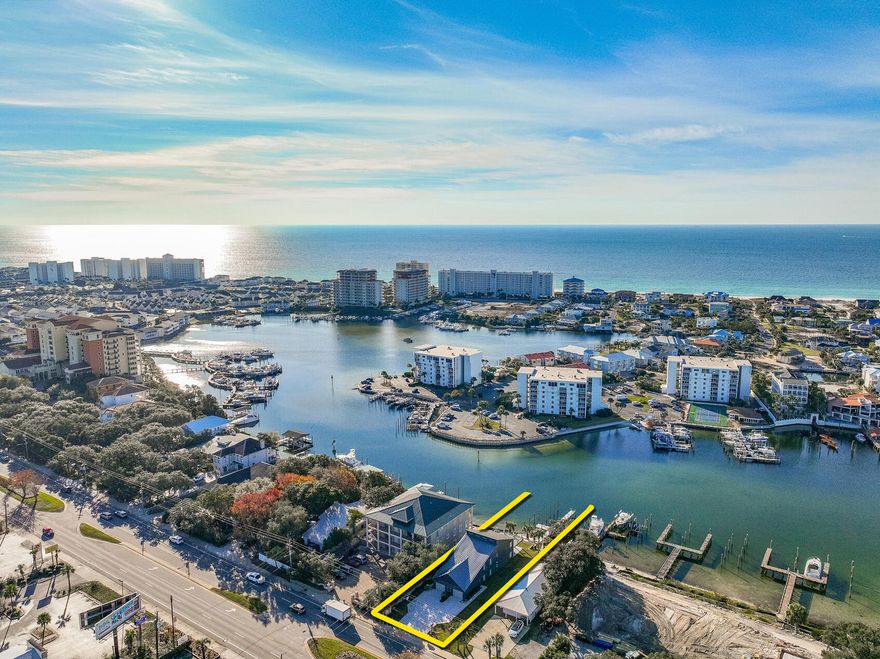 DUPLEX on the SCENIC HARBOR in Destin, Florida! NO HOA! ENTIRELY GUT-RENOVATED duplex featuring two enormous, DEEP-WATER BOAT SLIPS and a 100% new dock, deck, pier, and pilings. The entire duplex (first and second floor units) and its two homes incorporate the latest features, finishes, and building technologies pursuant to the current building codes. The new cutting-edge ES windows and doors contain impact-resistant glass throughout. Both homes contain new 'whole house' generators. The second floor features a vaulted ceiling, loft with bunks, two large bedrooms and two bathrooms, and an abundance of closet space. The second-floor deck is custom-milled from Ipe and is beautifully installed through its concealed fastening system. The custom tempered glass balustrade that..