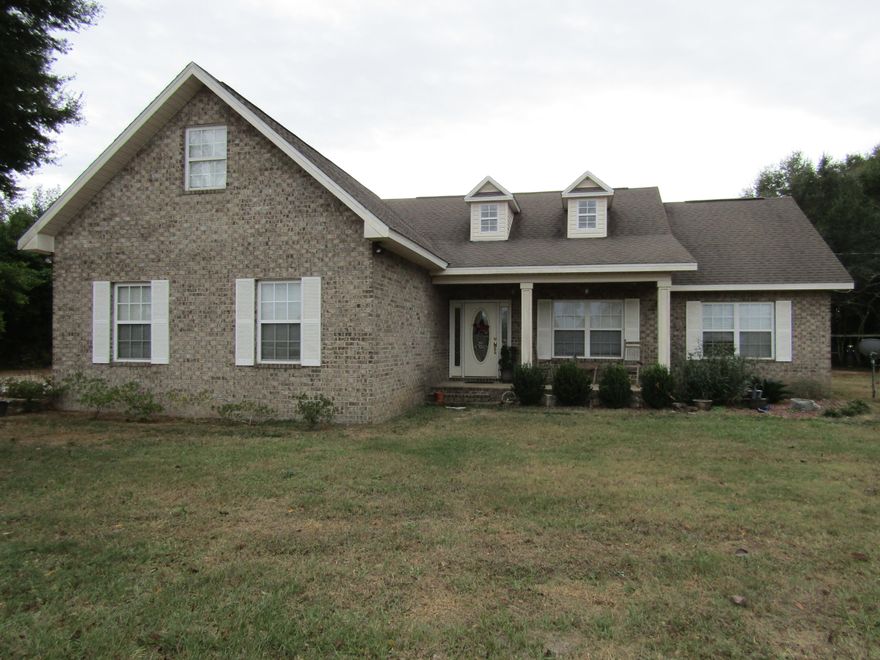 The best of both worlds, close to town but the peace and quiet of the country. No crowded neighborhood here, almost a full acre of yard for the family and a spacious barn style yard building. Spacious interior with split bedroom floor plan and a beautiful kitchen that will thrill the chef in your family with matching stainless steel appliances including refrigerator. 4th bedroom upstairs will make a great bedroom for a teenager or a nice private office with a view. The yard has beautiful mature trees and a well maintained lawn. This is the one you've been looking for! Too many extras to include here. Make an appointment with your realtor to come and see.