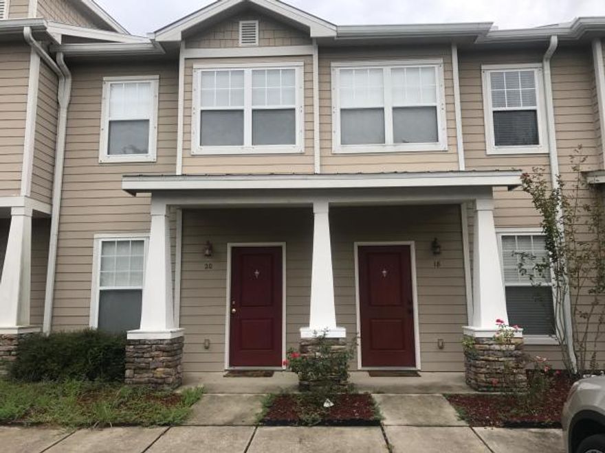 Great Rental Investment Opportunity on this well maintained 2 bedroom 2 and 1/2 bath townhouse with excellent rental history in the Verandas at Freeport. Featuring a well laid out open living, kitchen offers granite counter tops, black appliances, breakfast bar, and french doors to the Sunset views from the covered back porch. The two bedroom units offer a two ensuite bath floor plan. Beautiful Community pool. Located in close proximity to Freeport Schools.