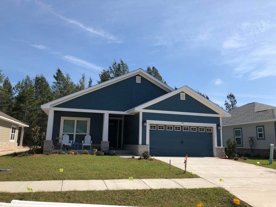 1820 SF Craftsman. Granite tops in kitchen and baths, COREtec Pro Plus vinyl plank flooring in main living areas and wet areas. Separate tub and shower in M. Bath. 2.5'' polyvinyl blinds throughout.