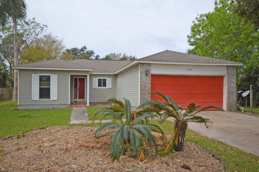 3 Bed, 2 Bath Navarre Knockout.Drive up your long, double driveway to your new Navarre home.Stepping onto the tiled floor, featured throughout the home, take a right to the kitchen, which offers over sized cabinets, stainless steel appliances, double-bowl sink, and an open floor plan that connects to the dining room. A broad counter and breakfast bar provide the perfect setting for those who like entertaining or evening hangouts with the household. A door off of the kitchen leads to the two car garage, laundry and a deep basin wash sink. The focus of the home is the sun-filled Florida room that provides a sweeping, sunny view of your backyard complete with a privacy fence.