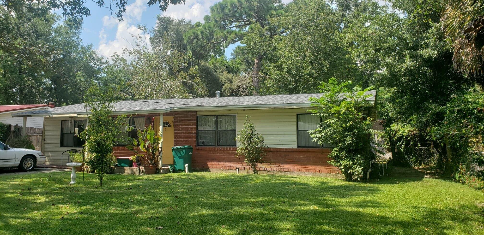 Under contract with 72 hour Kick Out clause in place. Accepting back up offers. A rare to find a One owner home. The owner bought this charming 3 bedroom 1 bath 1216 ft home from Warrington Home Builders back in 1961. Since then the family enclosed the carport to add an additional living space and inside laundry room thus, creating both a living room and a family room. They raised the new addition's floor to match the rest of the home. A new roof was installed in March of 2021. The home has Copper wiring, gas heat, gas water heater and gas stove. With some TLC this could make a wonderful family home. The home features bamboo flooring that has a good amount of wear on the finish but could be sanded and refinished for a wonderful and durable solid floor.