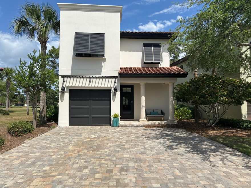 This stunning Mediterranean-style home, is located on a picturesque golf course lot in Villa Lago. With fresh paint both inside and out, and beautiful new furniture, artwork and accessories, the home radiates charm. The space is professionally and thoughtfully designed, offering a welcoming coastal contemporary aesthetic. The spacious layout includes 3 bedrooms, a bonus room, and 4 full baths, providing ample room for family gatherings while maintaining privacy. Additionally, the purchase of this home includes two new golf carts stored in the garage, allowing you to immediately begin enjoying the Sandestin lifestyle.