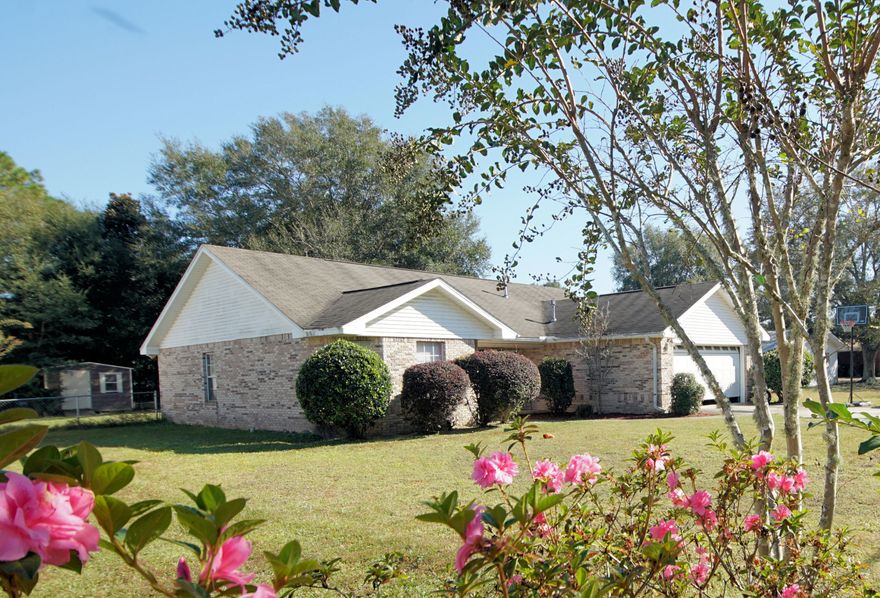 INVESTORS DELIGHT...All brick home centrally located in Crestview.  Home features spacious living room with hardwood flooring and a gas fireplace.  Solid surface countertops in the kitchen and bathrooms.  Garage is equipped with utility sink and pull down stairs.  Back yard is fenced with storage shed.  Property is being sold ''AS IS''.