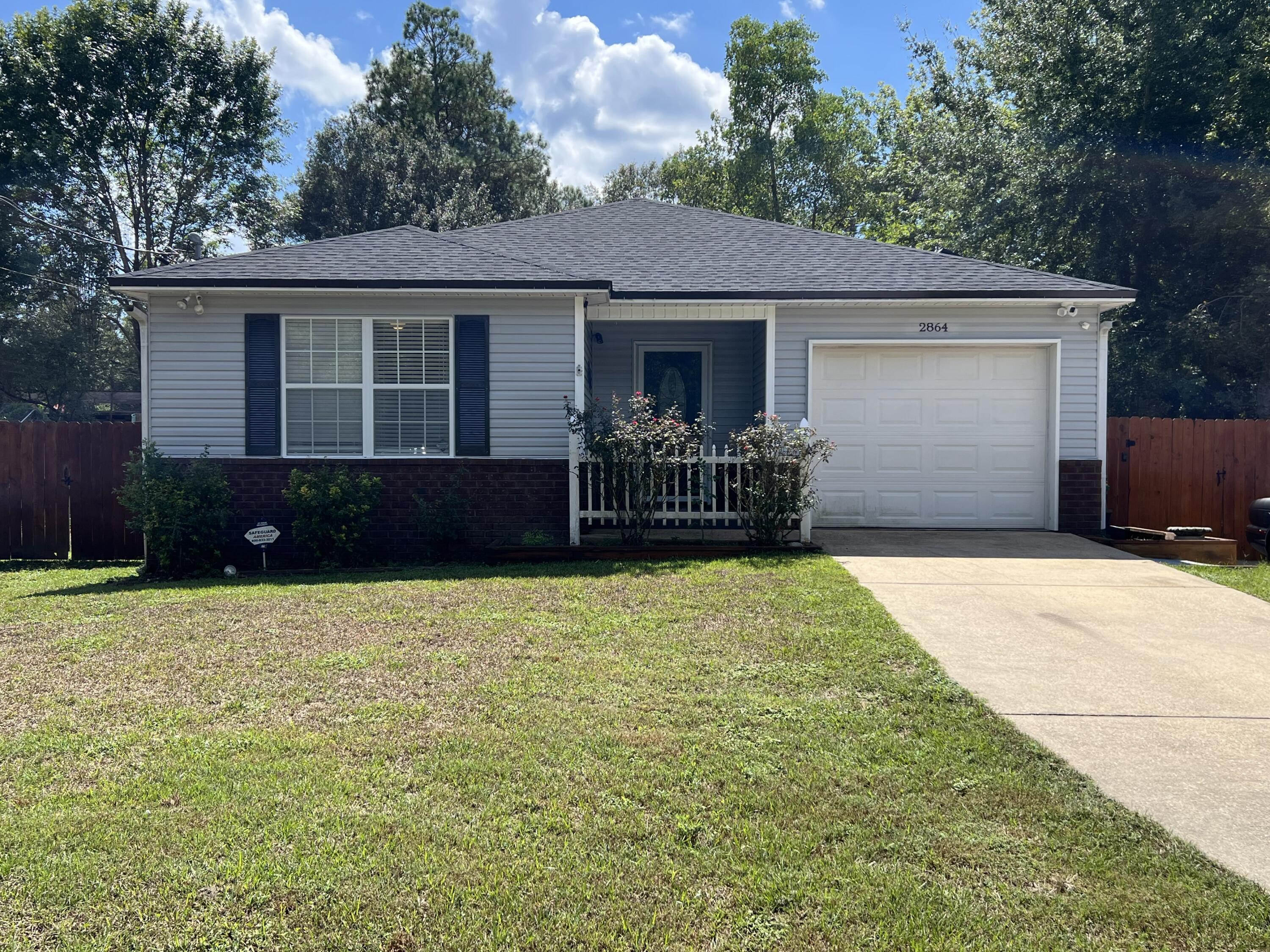Don't miss your opportunity to take advantage of this super cute home located in the Heart of Crestview. Built in 2007 and resting on nearly 1/2 acre, this 3 bedroom 2 bath has just under 1400sf of living space. Home has a single car garage and oversized, powered, detached workshop. Enjoy nearly free electricity and worry free roofing with a newly installed dimensional shingled roof AND Solar panels that are paid off. Water heater and HVAC have been recently replaced as well. Inside you will find updated baths, laminate floors, and granite tops. This one is a must see! Call today.