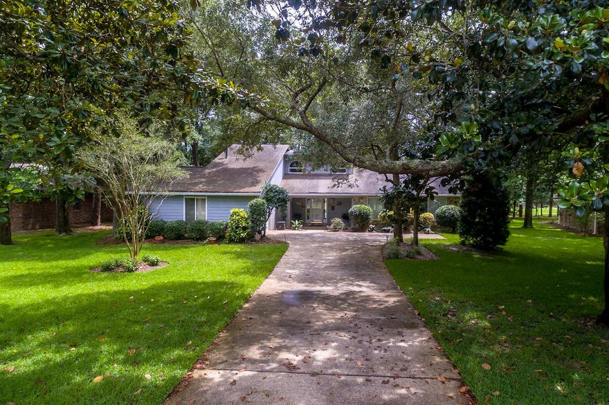 GOLF COURSE LIVING in the heart of Niceville! Enjoy panoramic views of the 13th fairway and green of the Rocky Bayou Country Club golf course. This must-see custom built home in Rocky Bayou Estates is situated on a large .40 acre lot, and boasts 3 bedrooms, 2 bathrooms, and 2374 square feet of living space. The thoughtfully appointed layout features an open floor plan, vaulted ceilings, and a wall of windows that showcase the golf course view.This ONE OWNER home has been meticulously maintained and beautifully updated! The kitchen was completely remodeled in 2011 with custom cabinetry featuring soft-close, full-extension drawers, pull-out shelving, tray dividers, hidden appliance storage, lazy susan,and custom glass facing on the top tier cabinets.
