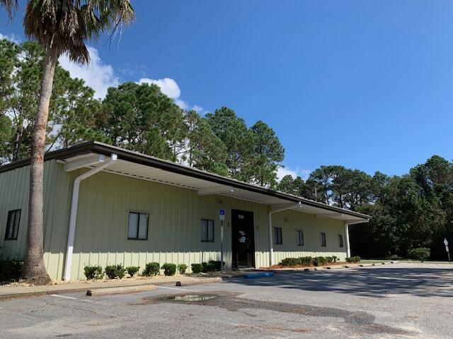 Excellent office space available in Fort Walton Beach, FL. The freestanding 2,992 SF multi-tenant office building is located in Okaloosa County near the Hurlburt Field military base. The property features ample parking and visibility off the highly trafficked Hill Avenue. Hill Avenue is the main road for military personnel traveling south from Hurlburt Field. The property has shared access and parking with the adjacent warehouse to the West, with three tenants occupying the adjoining property. The office space available, Suite A, consists of 2,400 SF and is built out as general office space with seven separate rooms, two bathrooms, a break room/ kitchen, and a storm shelter.