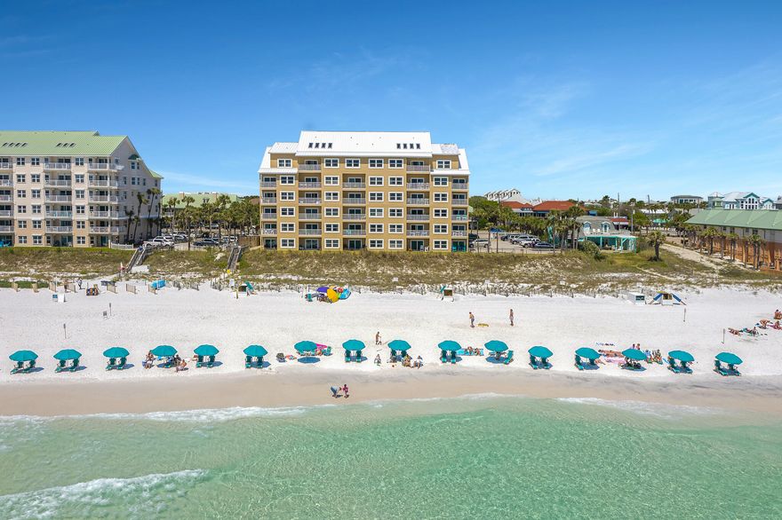 Destin's Finest! This amazing GULF FRONT condo features beach luxury at its finest and boasts amazing historical rentals. A private gated community w/ oversized pool, hot tub, and private beach! From the moment you arrive you are greeted by stunning views of the gulf waters and miles and miles of white beach sand at the tip of your toes. This open living concept is one your friends, family and vacationing guests will enjoy for a lifetime. The completely remodeled kitchen showcases granite countertops, stainless steel appliances and a gorgeous backsplash. Sold Fully Furnished-The sheeky and coastal boutique design resounds throughout along w/ Hardwood tile floors and crown molding. Master bedroom suite provides stunning gulf front views and oversized walk in closet. Washer/Dryer in unit