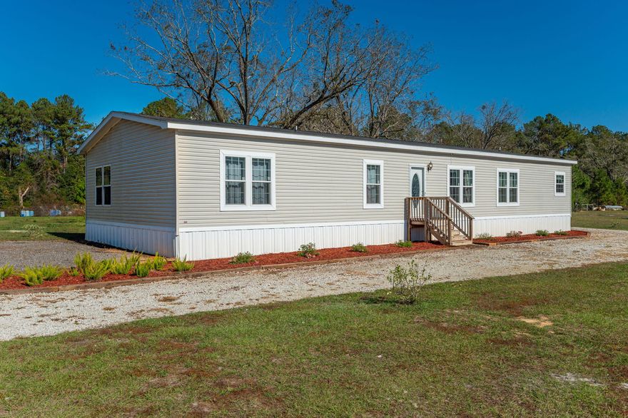 Looking for a nice quite place to call home? This 5 bedroom, 3 bath manufactured home has all the amenities and upgrades and is move in ready! Located in the North end of the county on a paved road in the Paxton school district! Home offers a large open space and floor plan that is perfect for any family. Home has a large living room, dining and a kitchen that dreams are made of to include a large commercial size refrigerator. Perfect for entertaining and family gatherings, this home missed zero detail when being built. Along with all the upgrades, home offers 5 bedrooms for your family and guest that are of perfect size, an amazing laundry room, and plenty of bathroom space for the entire family. Home is like new sitting on 2.5 acres with a great drive and a water view. Call today!!