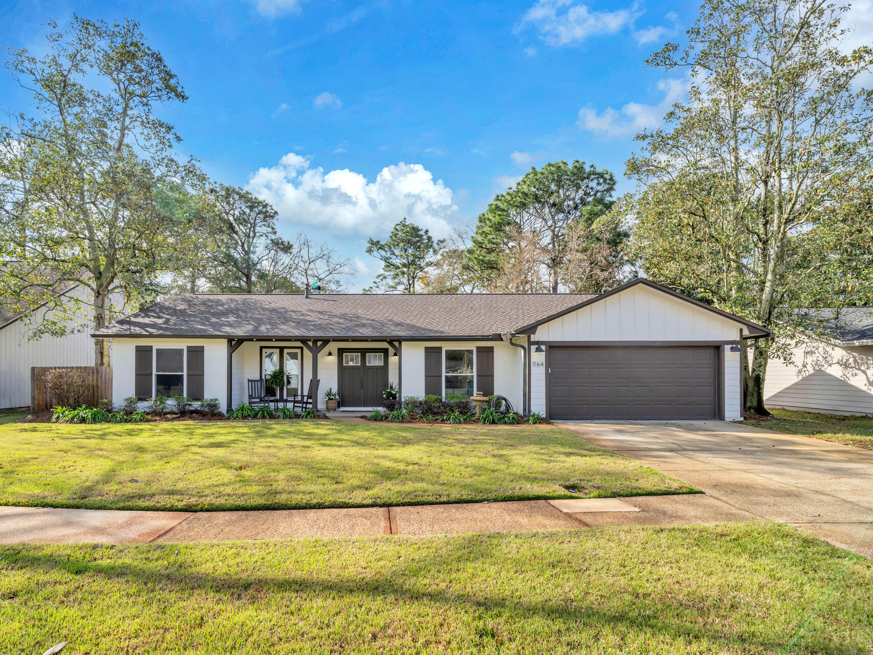 **3 BEDROOM + OFFICE - FULLY REMODELED INSIDE & OUT BY RANDY WISE HOMES!** This beautifully updated home features a PRIVATE BACKYARD OASIS with a SALT WATER POOL, FIRE PIT, and EXPANSIVE DECORATIVE PAVER PATIO. Relax in the 6 SEAT HOT TUB WITH 45 JETS or enjoy the LUSH FENCED GARDEN with a sprinkler system. Inside, the GOURMET KITCHEN boasts SOFT-CLOSE CABINETS, DOUBLE OVENS, A GAS STOVE, and a CUSTOM DRY BAR with floating shelves. The LIVING ROOM SHOWCASES A STACKED STONE GAS FIREPLACE with a 100-YEAR-OLD MANTEL and FRENCH DOORS LEADING TO THE BEAUTIFUL BACKYARD. The PRIMARY SUITE includes FRENCH DOORS to the HOT TUB & PATIO, a SPA-LIKE BATH with a SOAKING TUB, STEAM SHOWER, BODY SPRAYS, and a HEATED TOWEL RACK. Additional Upgrades Include a TANKLESS WATER HEATER, NEW ROOF (2022), hurricane-resistant windows, fenced garden, an outdoor shed, and a double garage with attic storage. PLENTY OF ROOM TO STORE A KAYAK AND JET SKI ON THE SIDE OF THE HOUSE! Located in an A-RATED SCHOOL DISTRICT AND JUST MINUTES FROM PIN OAK COMMUNITY PARK, OFFERING JET SKI AND KAYAK ACCESS TO THE BAYOU AND CHOCTAWHATCHEE BAY, No HOA! Schedule your private tour today!