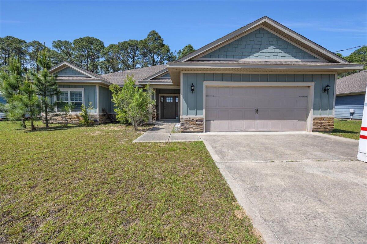 Looking for that perfect floorplan with four bedrooms and a price under $450,000 in Navarre? Then this is your home! As you enter the vast foyer into this 2018 Herbst resale, you will immediately feel invited to this well-thought-out and open plan. The den is expansive and is open to the kitchen, a large island and has split, generously-sized, bedrooms. Another great feature with this home is the spacious laundry with room for storage and folding area that also connects to the primary master closet. Imagine the convenience! Just minutes to the white sandy beaches of Navarre and only 13 miles to Hurlburt Field!