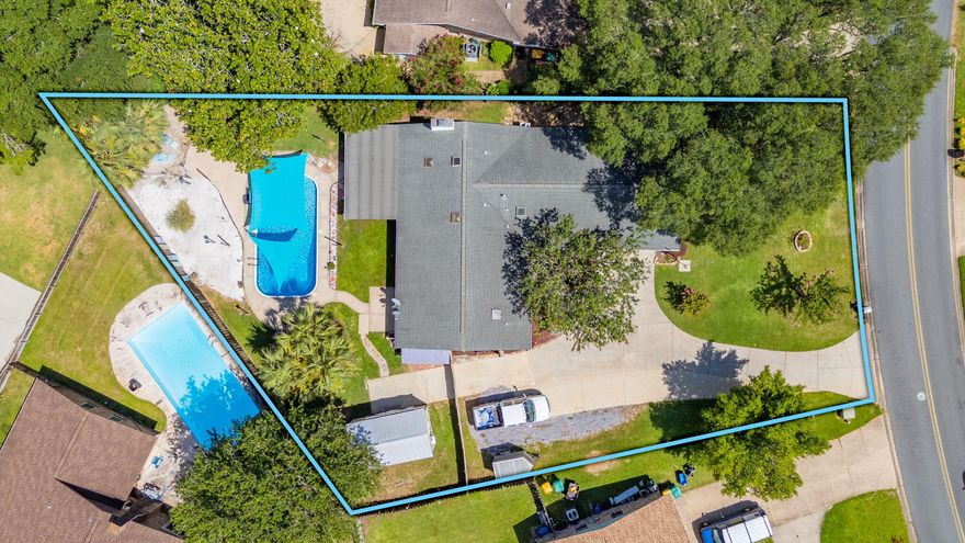 &#10024; New Price: $486,000 + $5,000 Seller Credit! &#10024;Lake Lorraine Estates--just minutes from Eglin and Hurlburt Field, and even closer to the stunning white-sand beaches of the Emerald Coast! This beautiful home blends comfort, convenience, and value. Inside, the cozy gas fireplace anchors the family room, perfectly situated near the updated kitchen with granite countertops. Tile and LVP flooring flow throughout the main living areas. The split floor plan offers a spacious primary suite with a fully renovated bath and French doors opening to your private backyard retreat. Two additional bedrooms, an updated full bath, and a versatile laundry/flex room (ideal for office or crafts) complete the interior. Step outside to your screened patio and sparkling in-ground pool, surrounded by lush tropical landscapinga true private oasis. The side yard features a 20' x 11' workshop with electricity and AC, plus an expanded driveway with RV hookup and room for your boat.

Key Updates: Roof (2011), HVAC (2019), Water Heater (2019/gas), New Pool Liner & Pump (2024).
Bonus: VA Assumable Mortgage at 3.75% available!

The privacy-fenced backyard is perfect for entertaining, relaxing by the pool, or weekend cookouts. No HOA. A rare find in a prime location!

=?? Call me or your favorite REALTOR?? today to schedule your private showing.