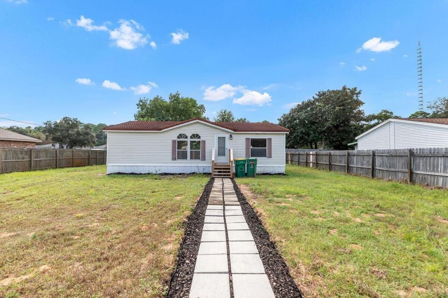 Welcome to this beautifully updated 2006-built mobile home on a .22-acre lot in Mary Esther! Just a few miles west of Hurlburt Field, this property is tucked away at the end of a quiet street, offering privacy and comfort. Inside, you'll find: *A brand-new kitchen with modern appliances *Fresh paint throughout *New flooring, fixtures, and doors *2 spacious bedrooms, each with its own full bathroom *The home also features a tiled roof for durability *Backyard complete with a storage shed. Whether you're looking for a starter home, downsizing, or investing, this one check all the boxes. Don't miss your chance to make it yours--schedule a showing today