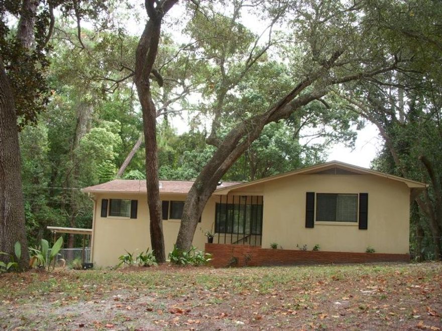 This Cove home is move in ready and has been updated with new windows, $2000 worth of blinds, electrical, plumbing, insulation, kitchen cabinets and appliances. Very open floor plan with hard wood floors, gas fireplace & security system. This home offers a lot of character. The deck across the back of the home provides a lot of room for entertaining & privacy. The basement houses the laundry room with front load washer & dryer with pedestals & a full bathroom & lots of storage. All the living areas are on the main floor of the home. Split bedroom plan. European kitchen with stainless appliances. It's close to the Bay hospital & Tyndall Air Force Base. The owner says boat slips are for rent on the bayou right around the corner for $150 a month. Home warranty good thru March.